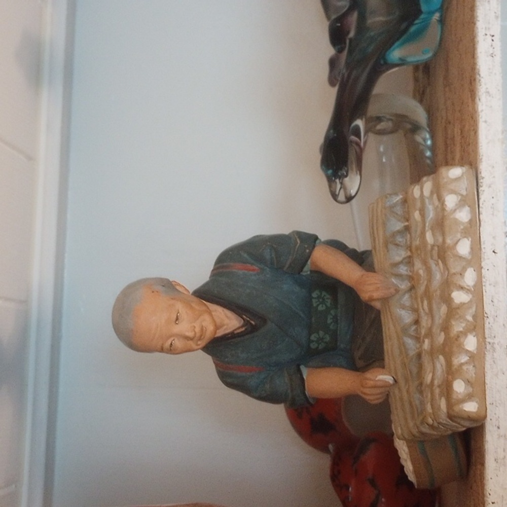 Urasaki art sculpture Egg Merchant